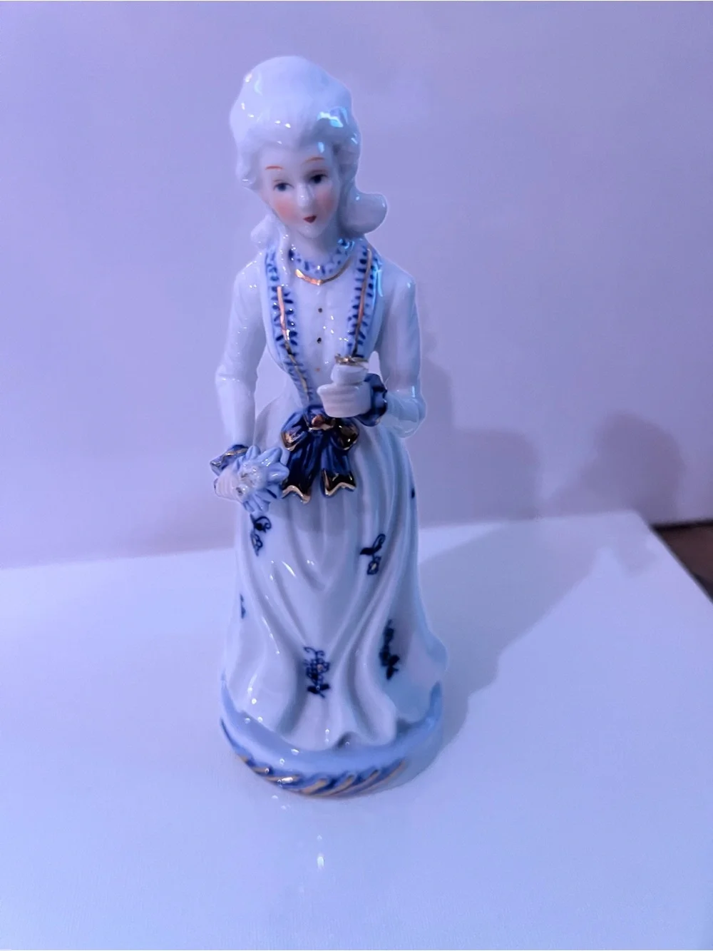 Vintage Hand-Painted Porcelain Lady Figurine in White, Blue & Gold